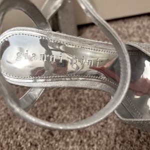Silver Gianni Bini platform heels.